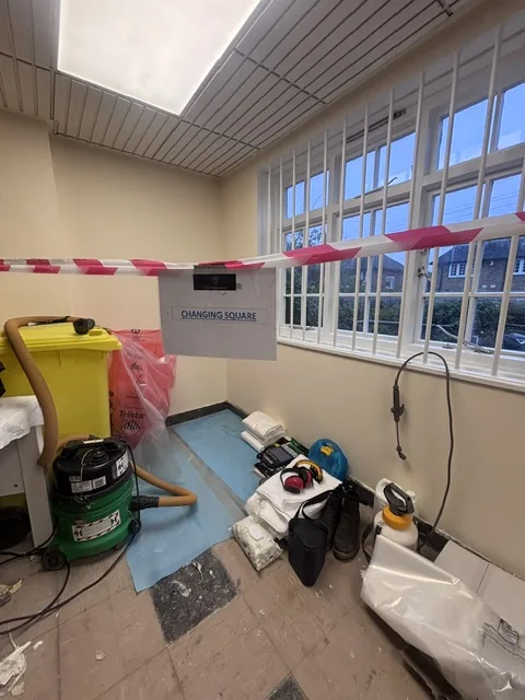 Asbestos floor tile and bitumen removal in Cricklewood